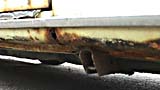 Rusted rocker panel (strip below door)