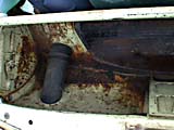 Rust in spare tire space in trunk